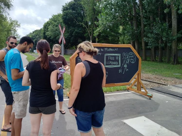 Lindsay catches walkers on the Spurline Trail to complete the neighoburhood survey