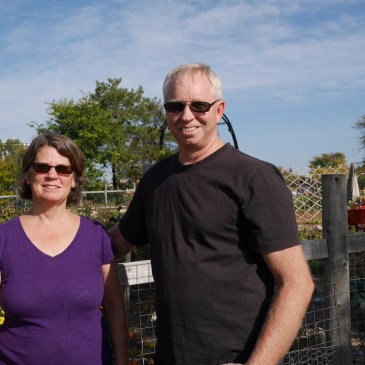 Steve and Kathy Hiller visit the Geulph Street Community Garden where Steve's Hiller family lived decades ago.