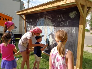 Neighbourhood kids create art for the back side of the chalkbaords