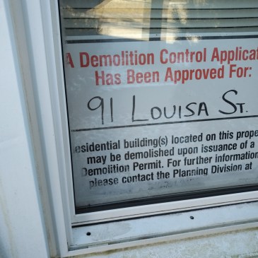 example of community information sign for a demolition request on a Louisa Street property